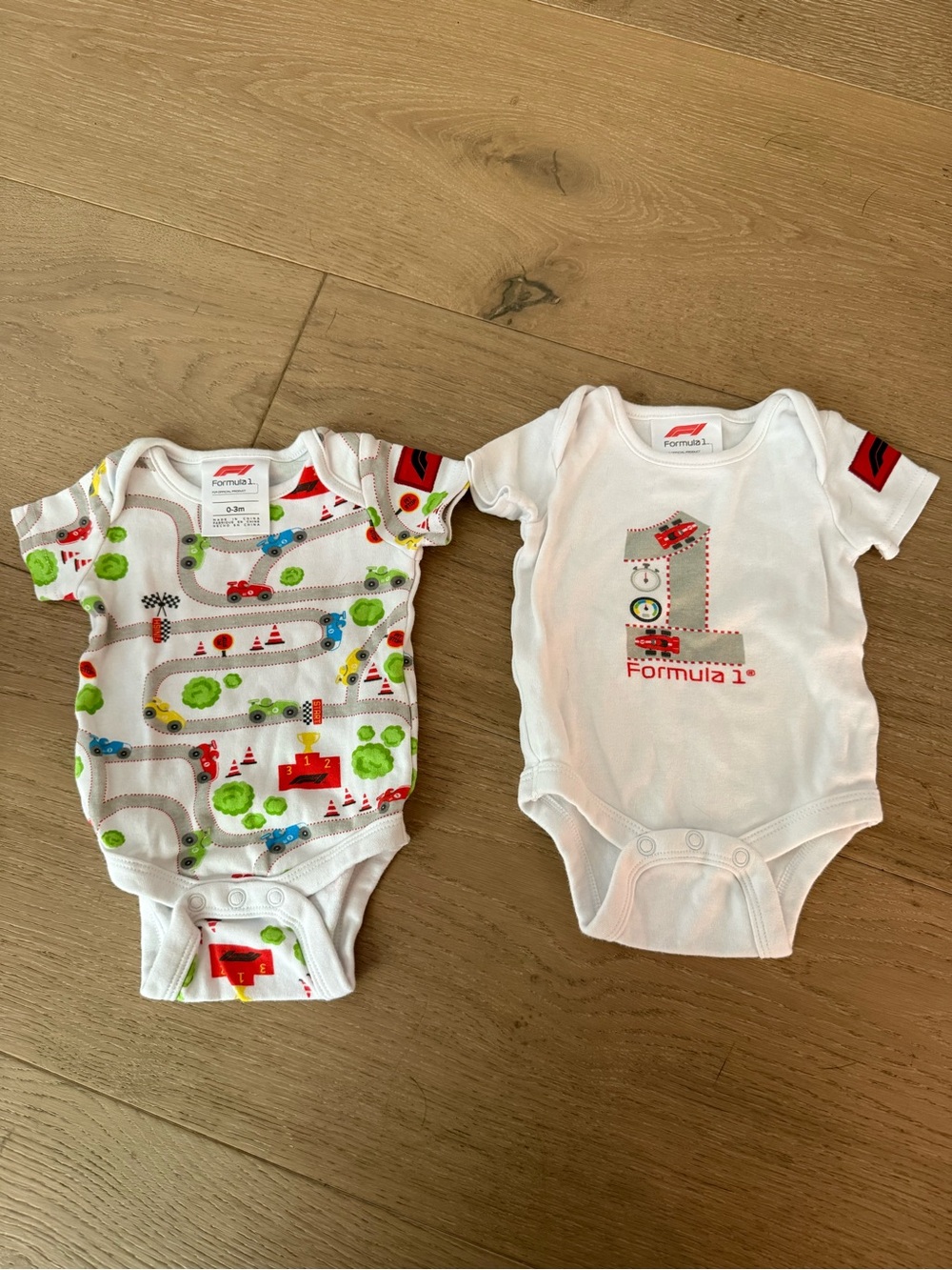 Formula 1® White & Multi Race Car Baby One-Piece Set Sz 0-3
